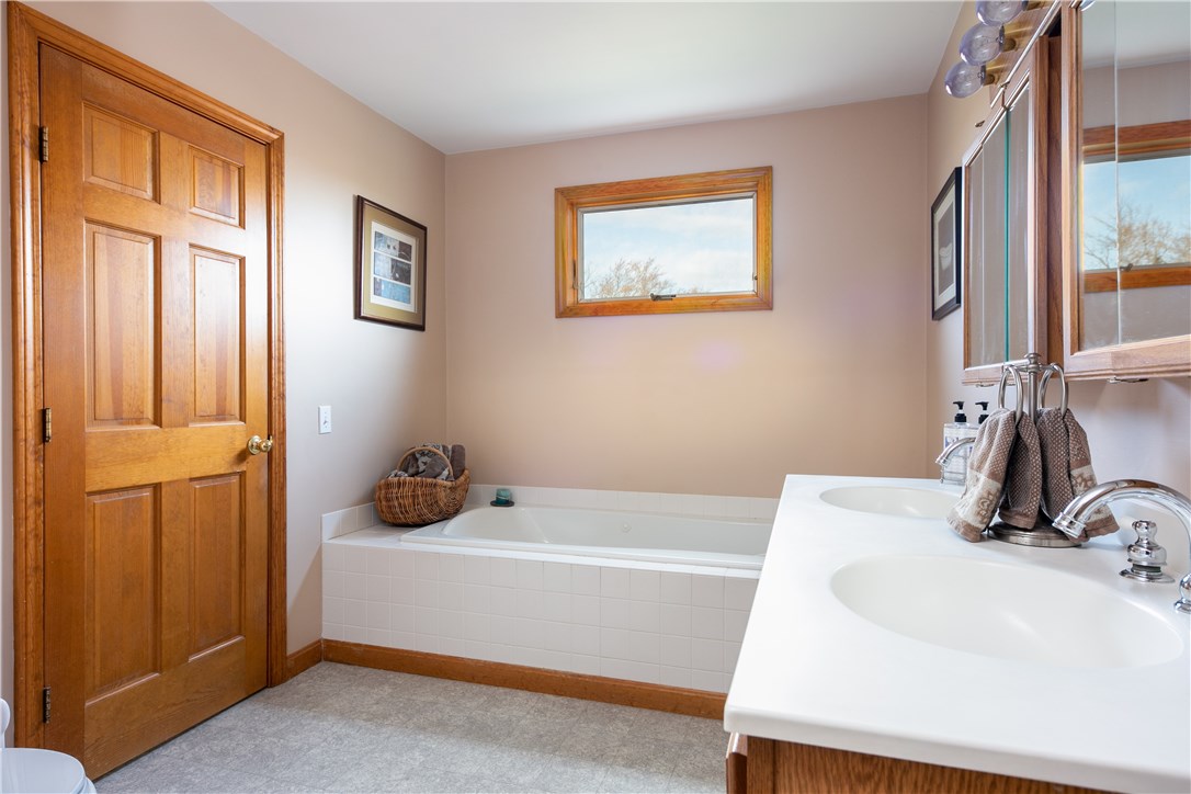 459 Wapping Road Portsmouth, RI 02871 - Photo 23 of 38 Double sinks, storage cabinets, Jacuzzi tub and s separate shower ( not shown)