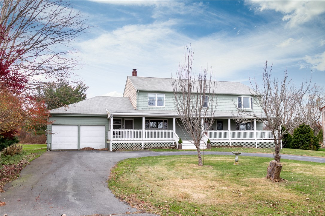 459 Wapping Road Portsmouth, RI 02871 - Photo 3 of 38 The semi circular driveway includes plenty of parking and the oversize 2 car garage has a separate storage room. Lots of potential for a buyer with a need for a work shop.