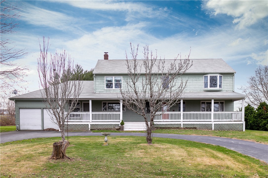 459 Wapping Road Portsmouth, RI 02871 - Photo 4 of 38 The property has a border of evergreen trees for privacy as well as flowering trees in the warmer months.