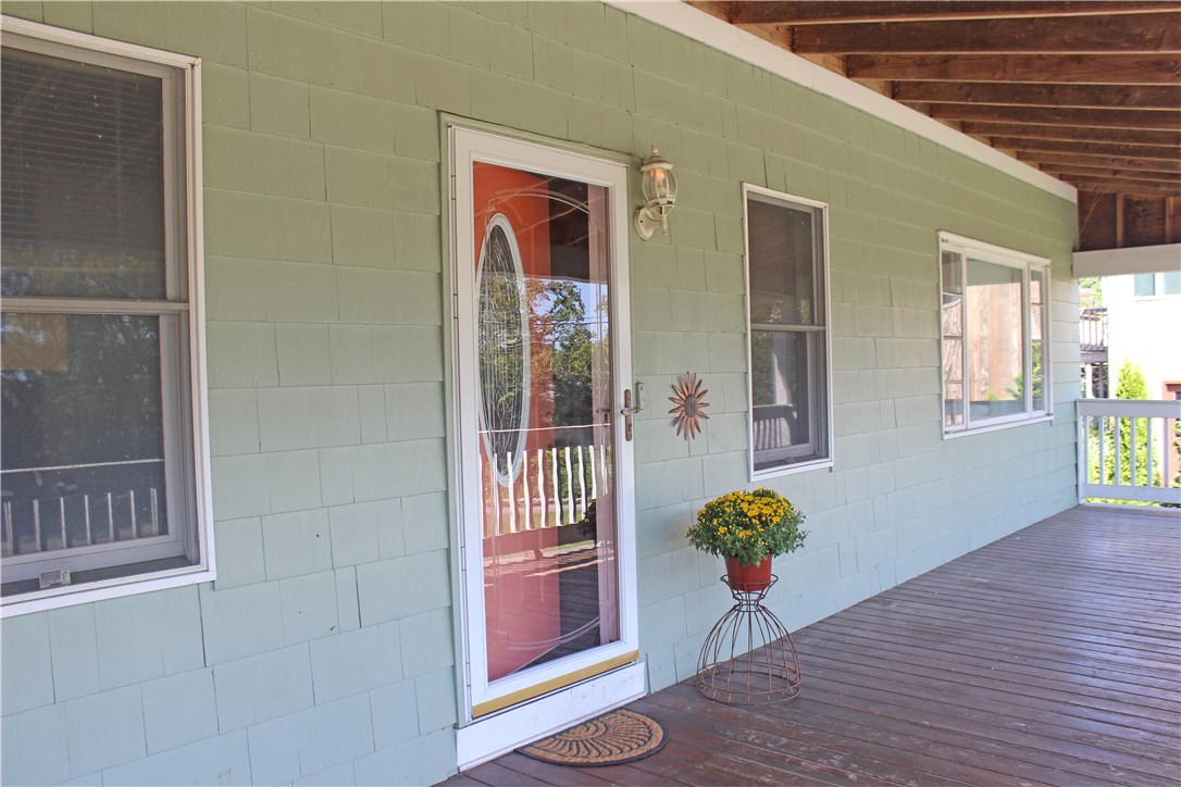 459 Wapping Road Portsmouth, RI 02871 - Photo 5 of 38 This 10 x 60 covered Farmers porch joins the old and the new.