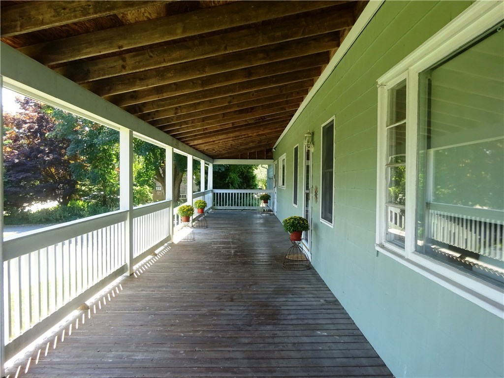 459 Wapping Road Portsmouth, RI 02871 - Photo 6 of 38 Ideal sheltered additional living space to enjoy Spring, Summer and Fall, facing east and the sunrise and moonrise over the Sakonnet River
