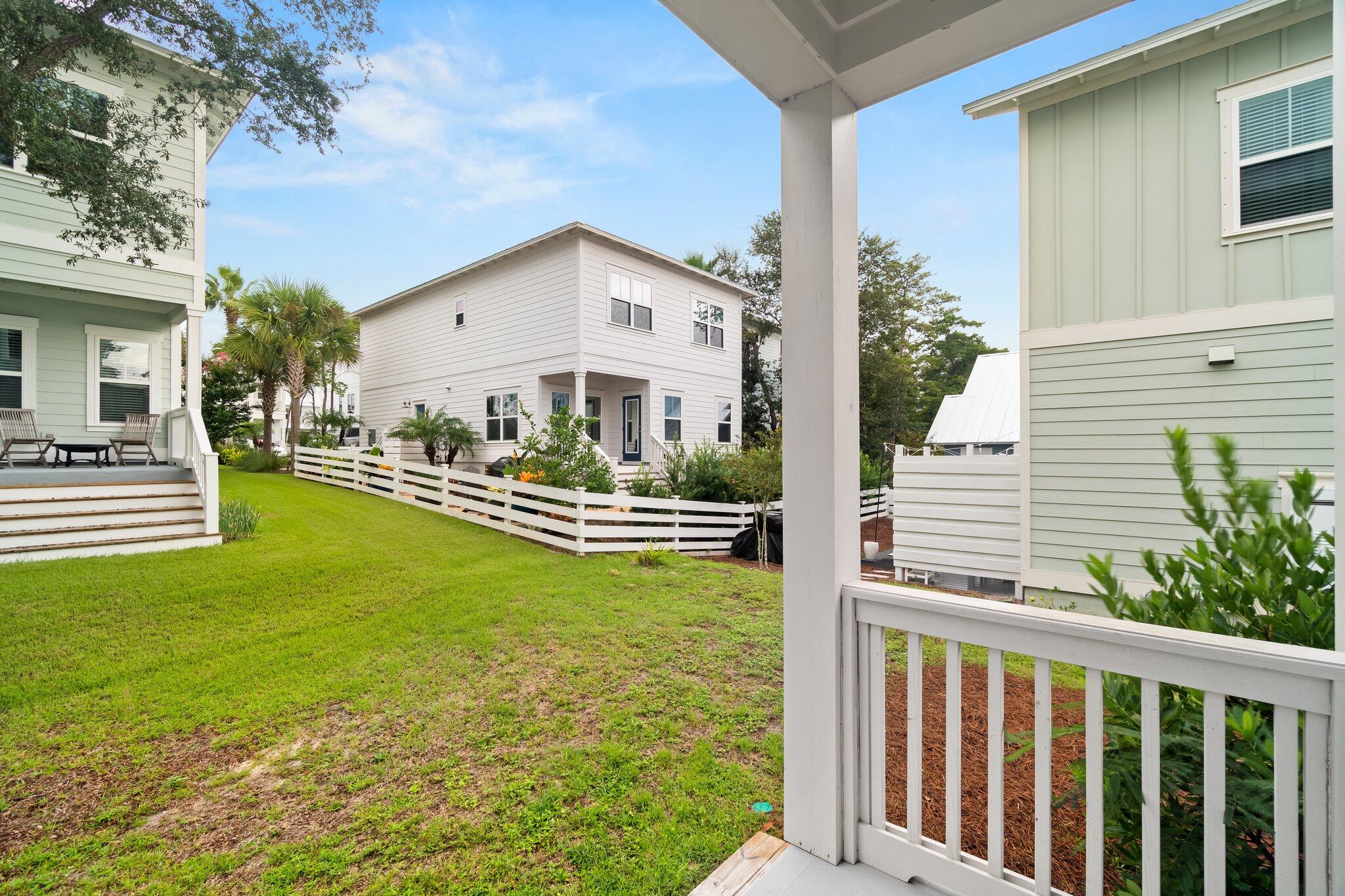 99 Grande Pointe Circle Inlet Beach, FL 32461 - Photo 13 of 34 a front view of a house with garden