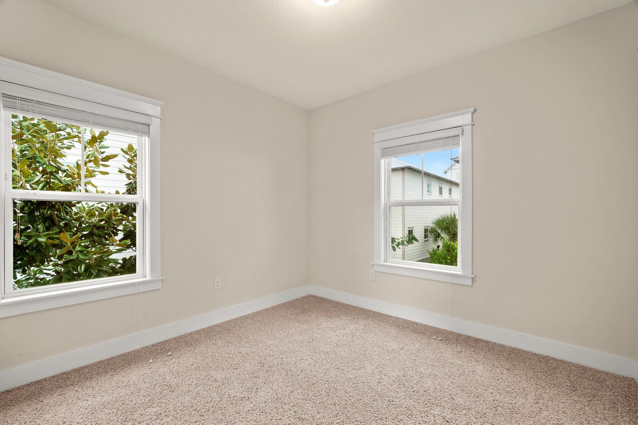 99 Grande Pointe Circle Inlet Beach, FL 32461 - Photo 16 of 34 an empty room with windows