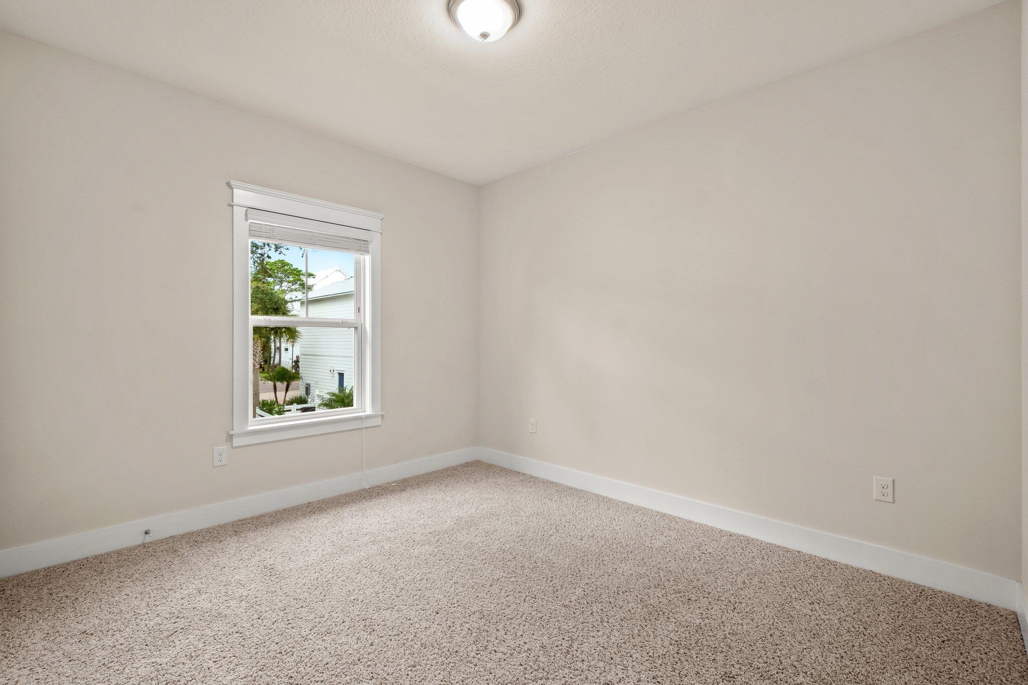 99 Grande Pointe Circle Inlet Beach, FL 32461 - Photo 19 of 34 an empty room with a window