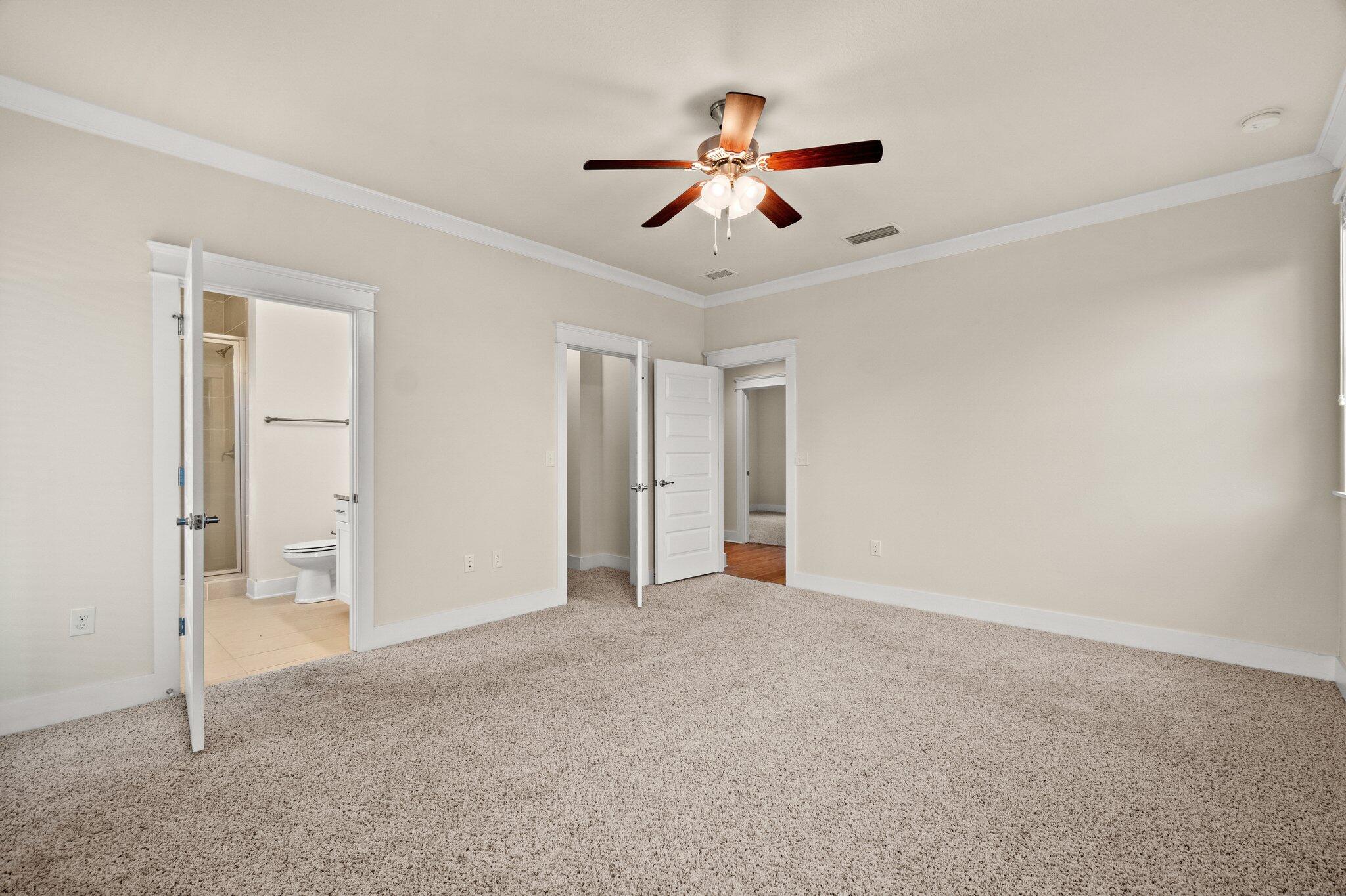 99 Grande Pointe Circle Inlet Beach, FL 32461 - Photo 22 of 34 a view of an empty room with chandelier fan