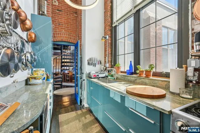 a room with furniture and wooden floor