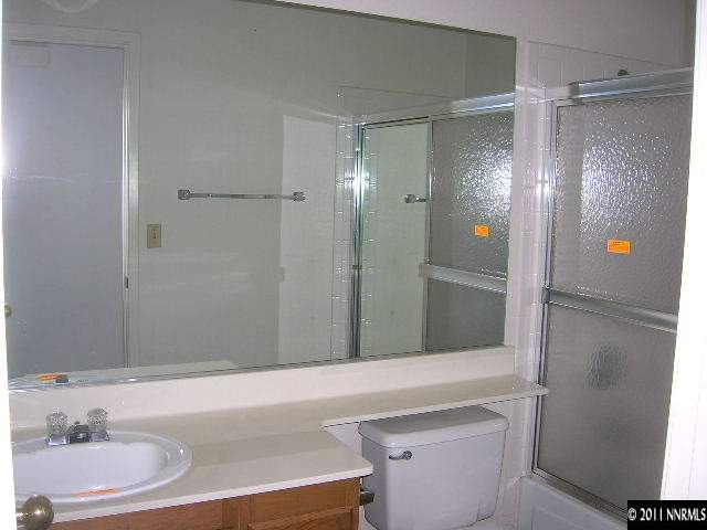2370 High Terrace Drive Reno, NV 89509 - Photo 11 of 13 a bathroom with a bathtub and a sink
