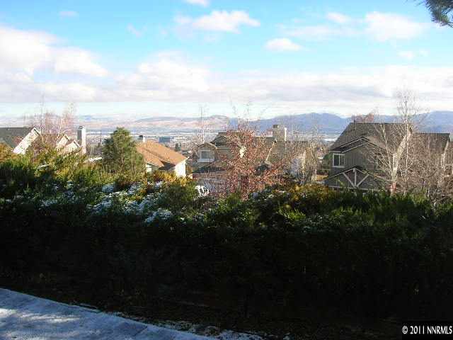 2370 High Terrace Drive Reno, NV 89509 - Photo 2 of 13 a view of a city with lush green forest