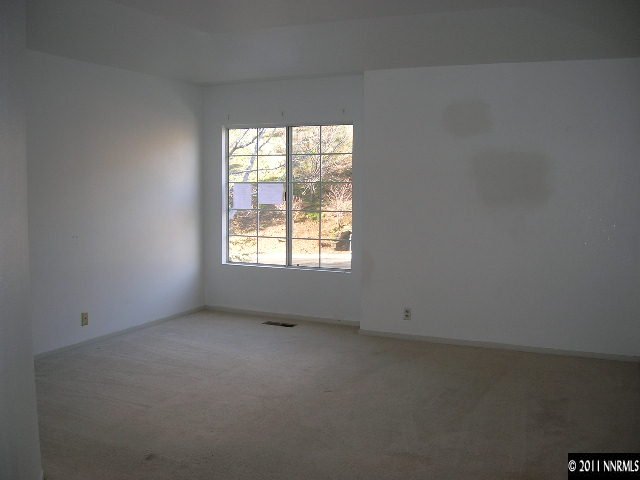 2370 High Terrace Drive Reno, NV 89509 - Photo 8 of 13 an empty room with a window
