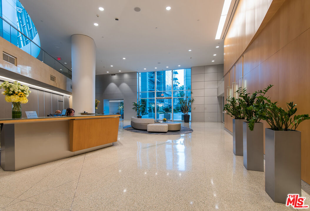 13600 Marina Pointe Drive, Unit 1904 Marina del Rey, CA 90292 - Photo 33 of 57 a lobby with furniture and a potted plant