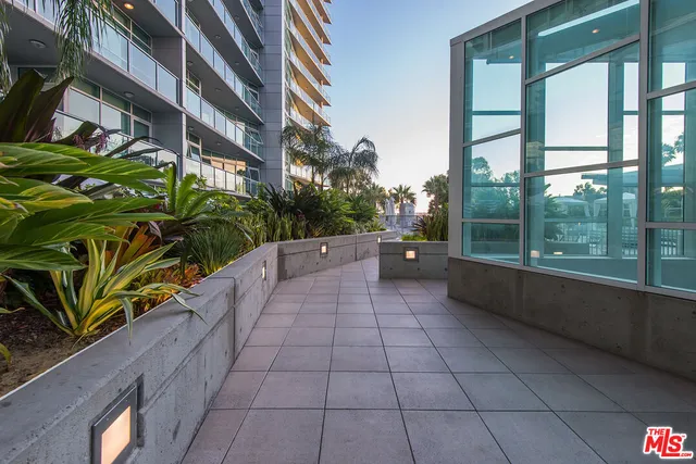 a view of swimming pool from a patio