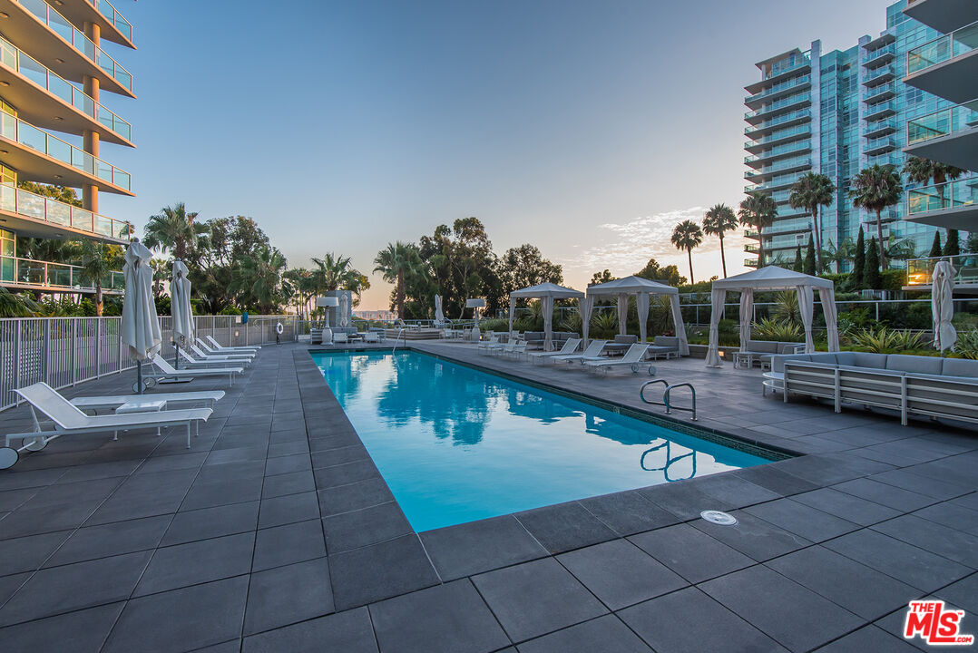 13600 Marina Pointe Drive, Unit 1904 Marina del Rey, CA 90292 - Photo 37 of 57 a view of swimming pool from a patio