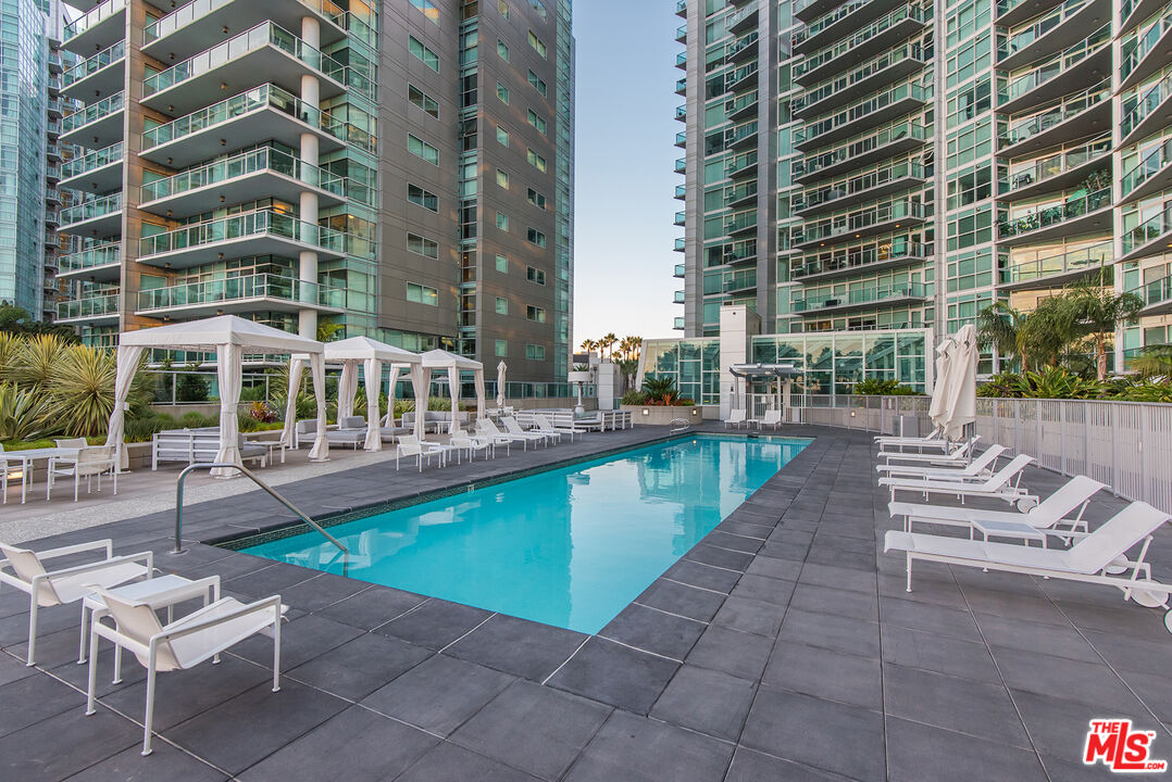 13600 Marina Pointe Drive, Unit 1904 Marina del Rey, CA 90292 - Photo 38 of 57 a view of a building with garden