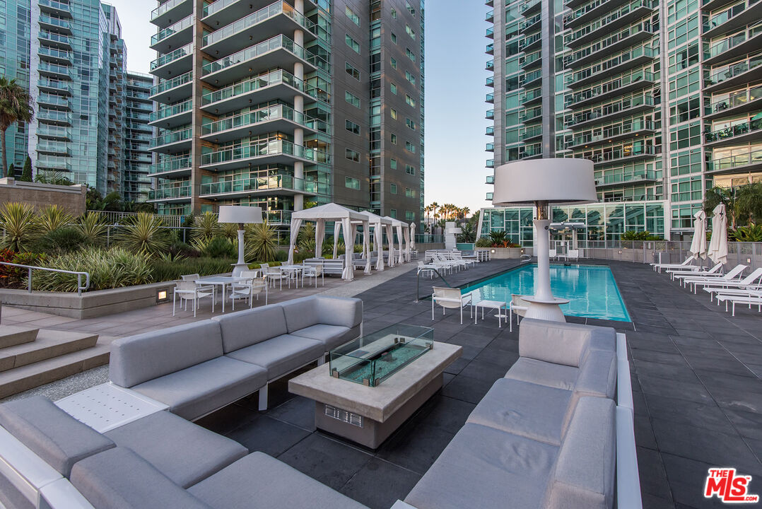 13600 Marina Pointe Drive, Unit 1904 Marina del Rey, CA 90292 - Photo 40 of 57 a view of a patio with chairs and a patio