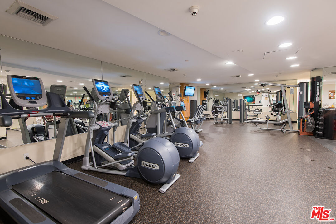 13600 Marina Pointe Drive, Unit 1904 Marina del Rey, CA 90292 - Photo 46 of 57 a view of a room with gym equipment