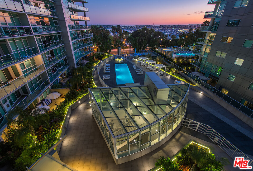 13600 Marina Pointe Drive, Unit 1904 Marina del Rey, CA 90292 - Photo 52 of 57 a view of a swimming pool with outdoor seating