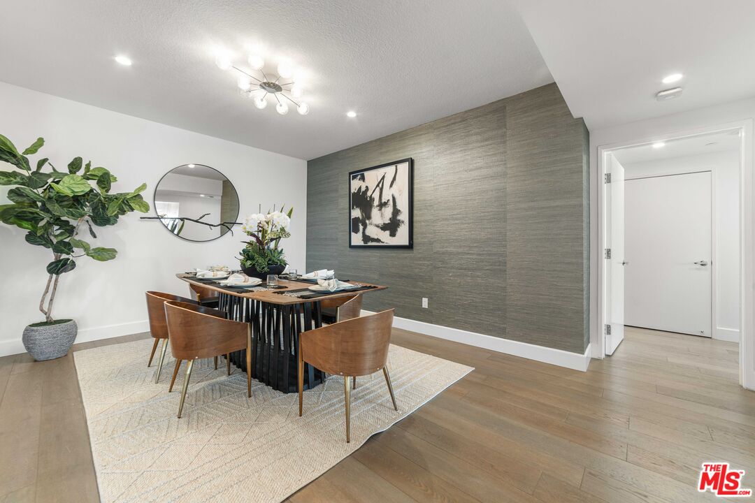 13600 Marina Pointe Drive, Unit 1904 Marina del Rey, CA 90292 - Photo 6 of 57 a dining room with furniture and window