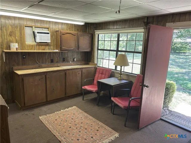 a living room with a couch and a table