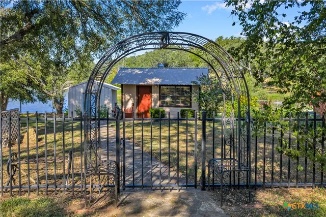 a view of swimming pool with a garden