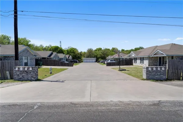 a view of a house with a swimming pool