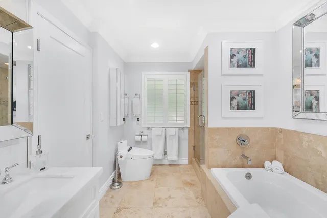 a bathroom with a shower and a bathtub