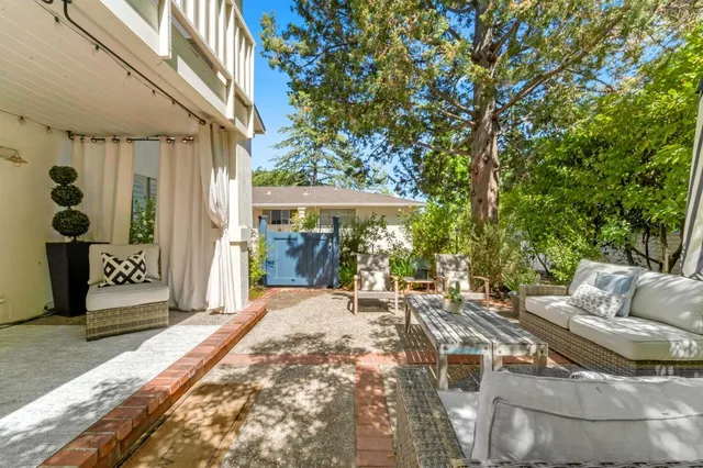 a view of yard with patio