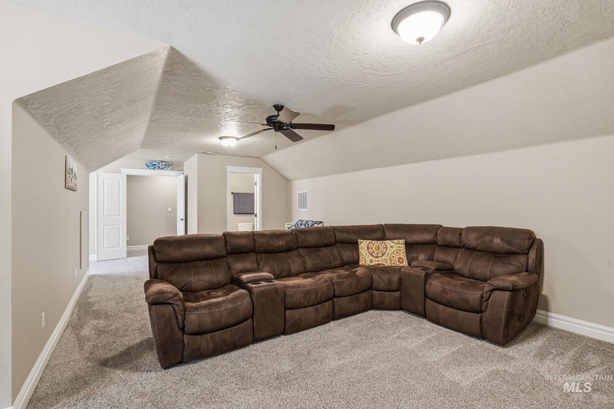 3969 North Hollymount Way Meridian, ID 83646 - Photo 33 of 47 Carpeted room featuring sloped ceilings and recessed lighting