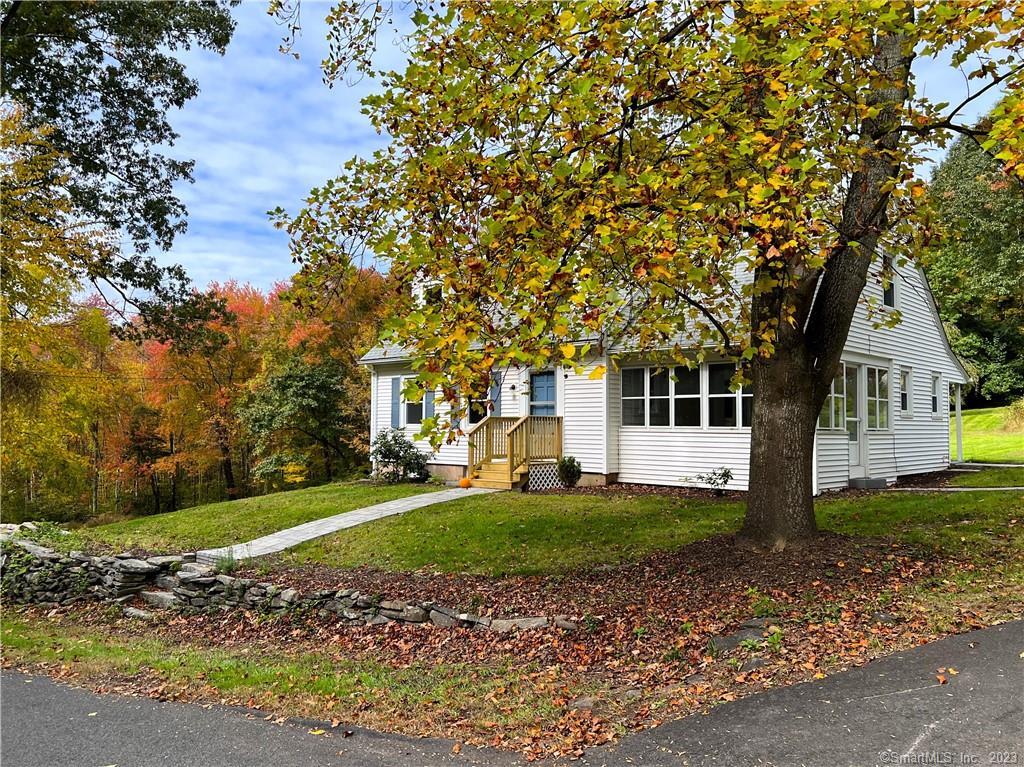 378 Cox Road Portland, CT 06480 - Photo 1 of 1 a view of a house with a yard