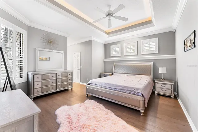 a bedroom with a bed and a walk in closet