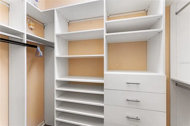 a view of an empty walk in closet