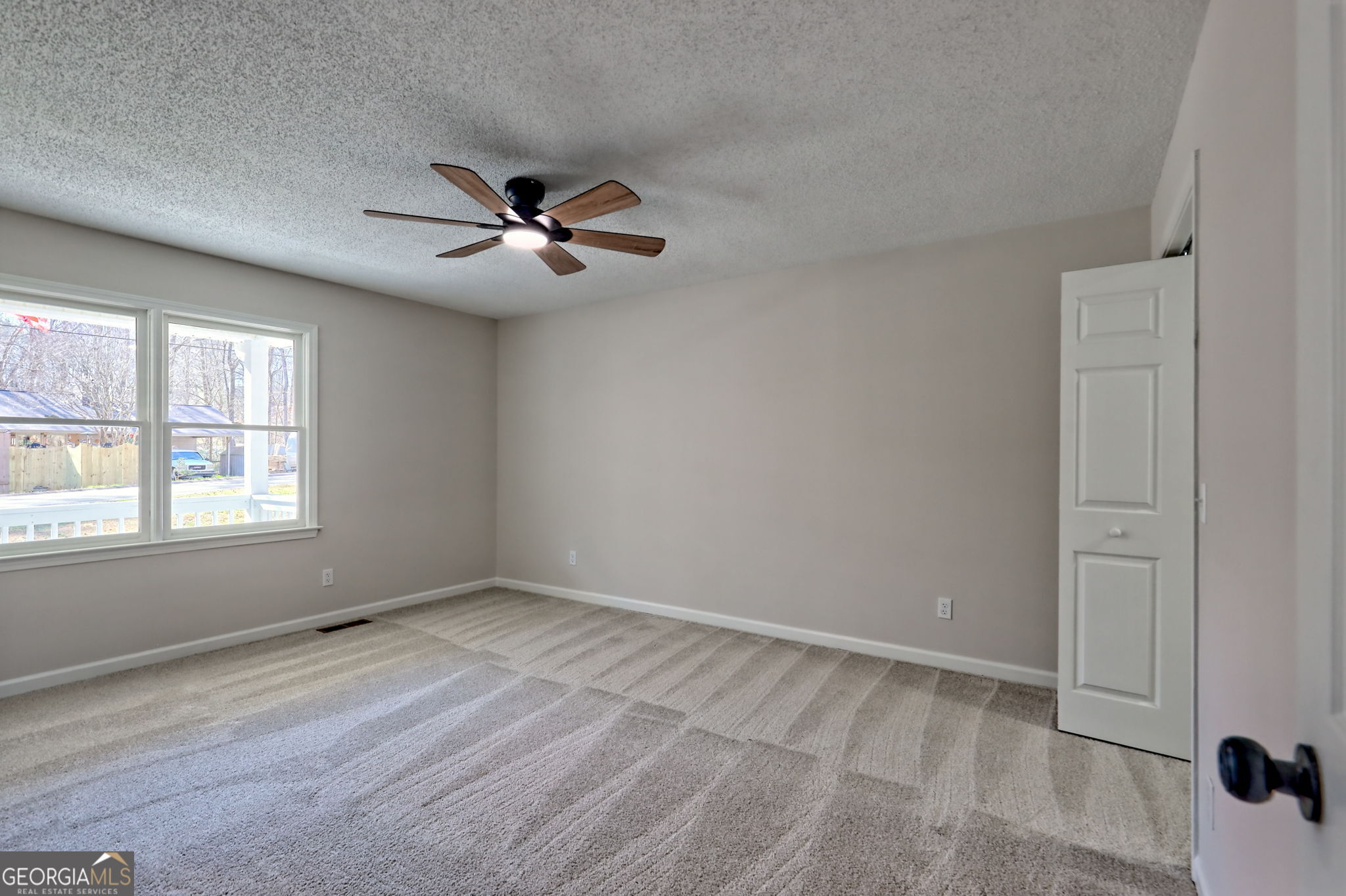 233 Piney Ridge Road Jasper, GA 30143 - Photo 12 of 38 wooden floor in an empty room with a window