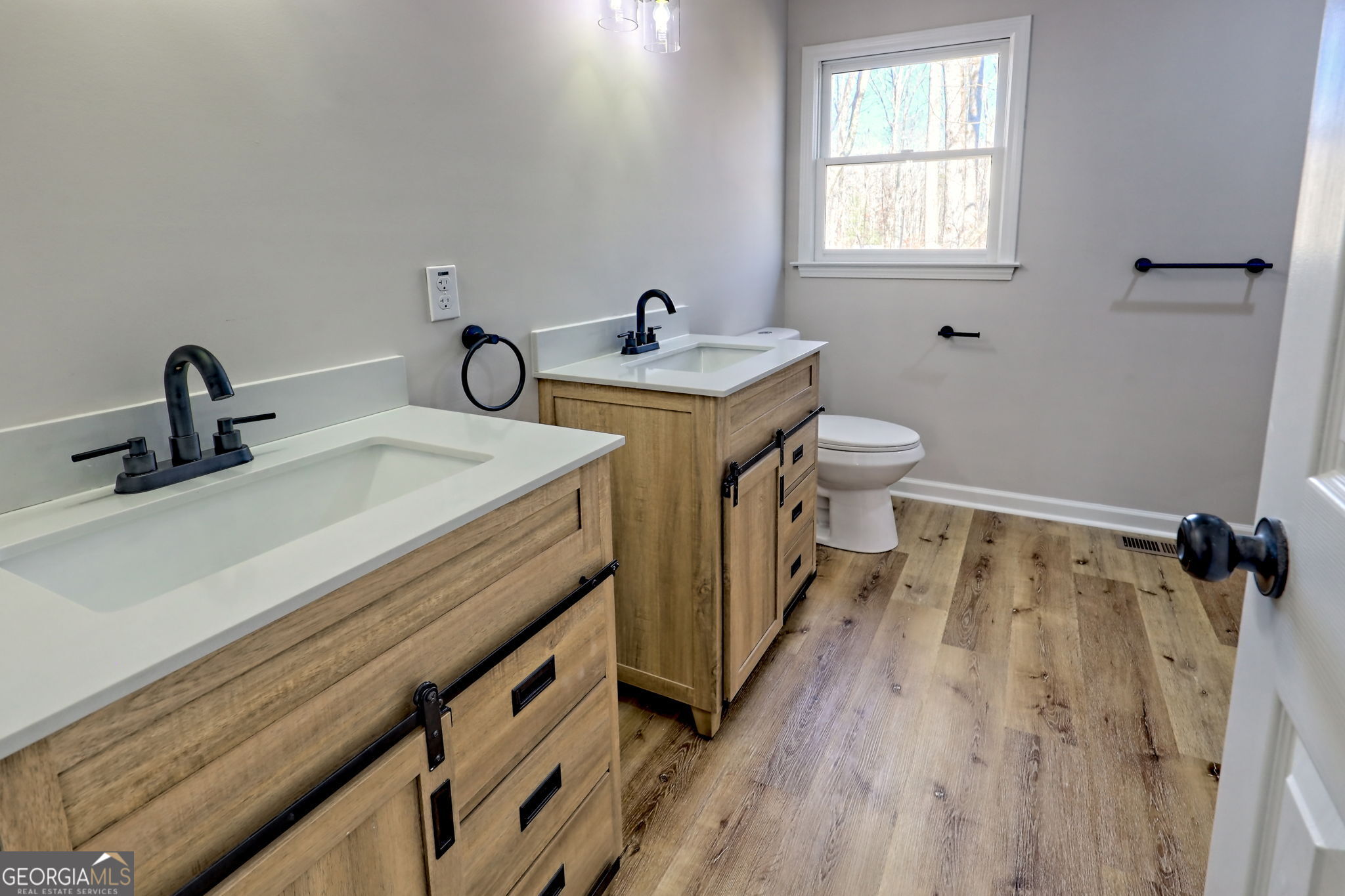 233 Piney Ridge Road Jasper, GA 30143 - Photo 13 of 38 a bathroom with a sink and a toilet
