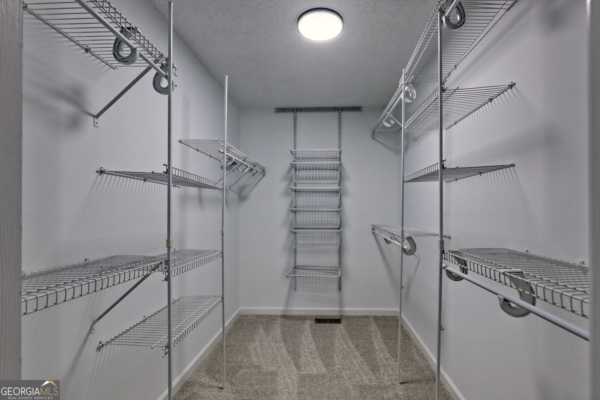 233 Piney Ridge Road Jasper, GA 30143 - Photo 16 of 38 a view of a room with racks on the wall