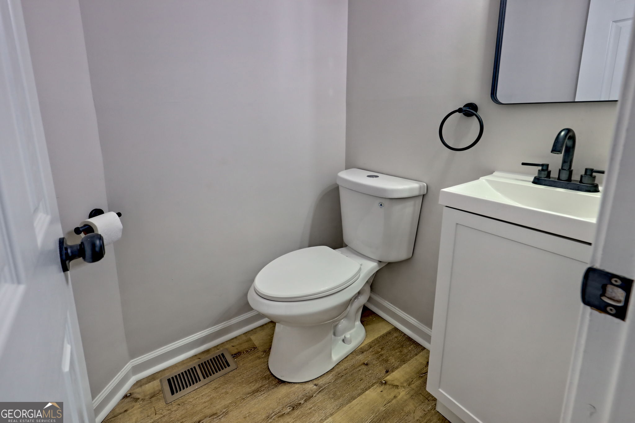 233 Piney Ridge Road Jasper, GA 30143 - Photo 17 of 38 a bathroom with a toilet and a sink