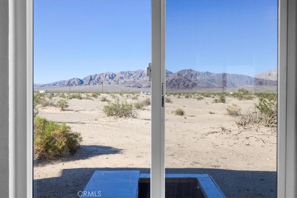 84753 Eddie Albert Road Twentynine Palms, CA 92277 - Photo 14 of 52 a view of a window with an ocean view