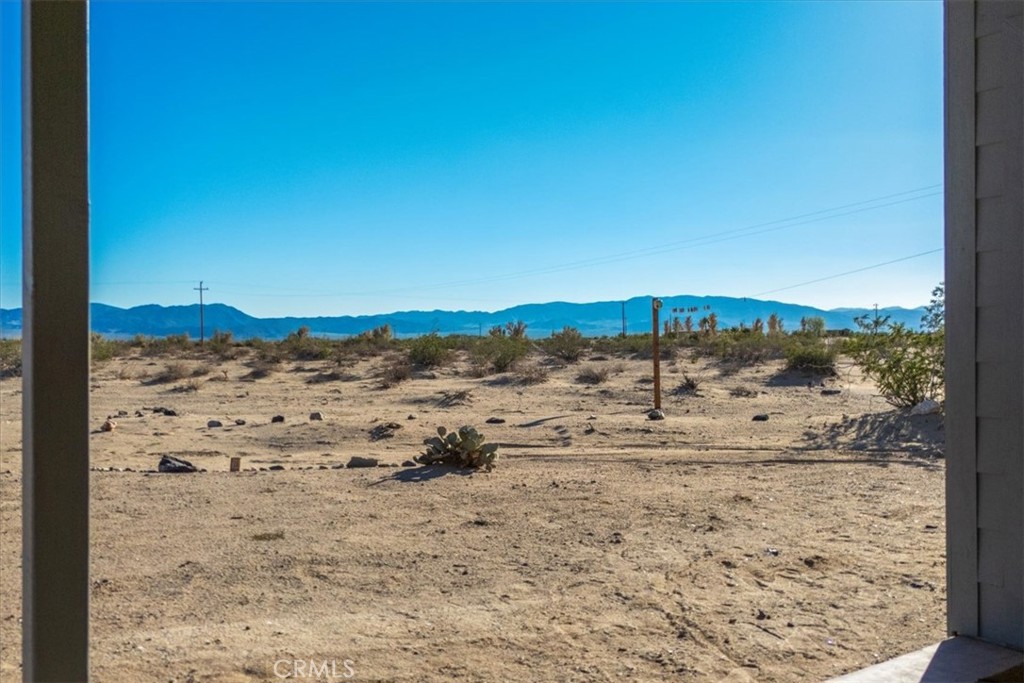 84753 Eddie Albert Road Twentynine Palms, CA 92277 - Photo 26 of 52 a view of ocean view and mountain
