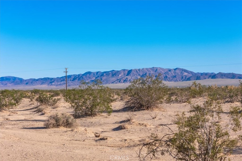 84753 Eddie Albert Road Twentynine Palms, CA 92277 - Photo 27 of 52 a view of a large body of water with a building in the background