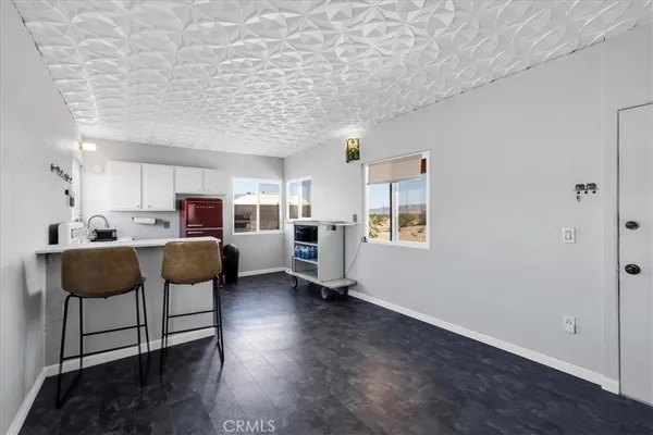 a view of livingroom with furniture and wooden floor