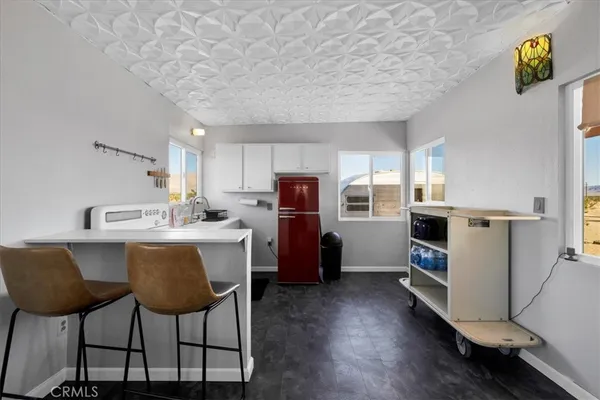 a view of livingroom with hallway and bathroom