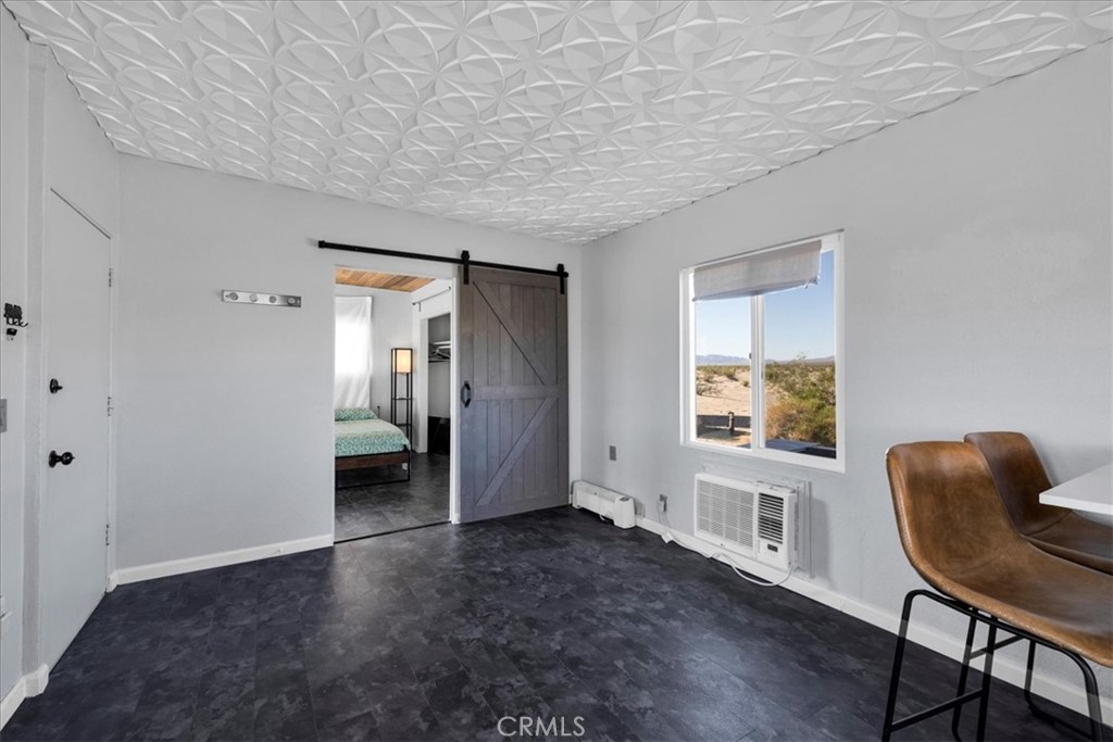 84753 Eddie Albert Road Twentynine Palms, CA 92277 - Photo 8 of 52 a view of livingroom with furniture and wooden floor