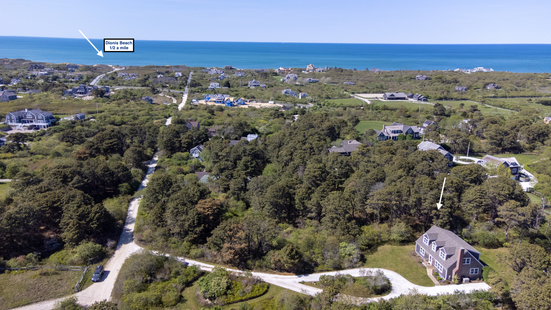 15 Swift Rock Road Nantucket, MA 02554 - Photo 1 of 32 an aerial view of a residential houses and city view