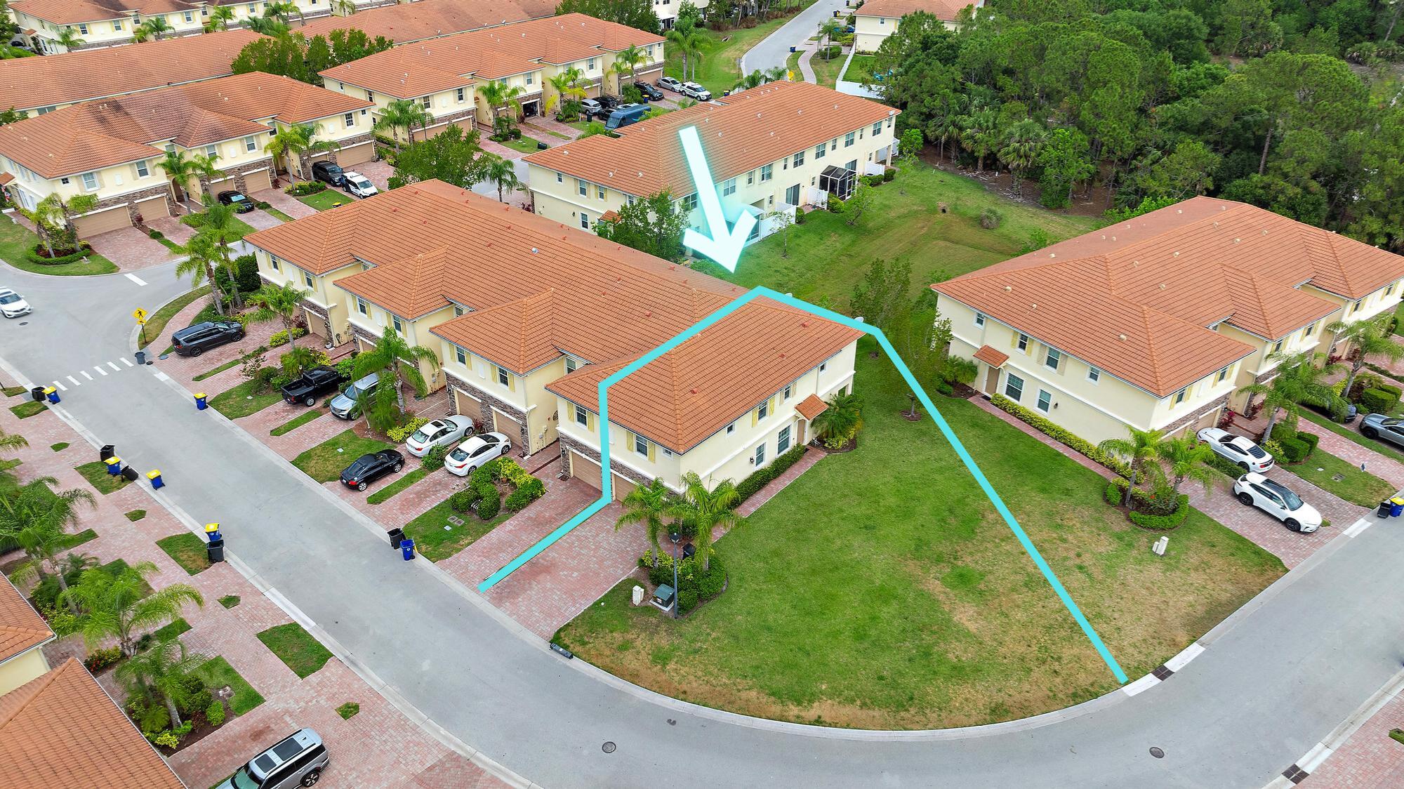 9677 Southwest Purple Martin Way Stuart, FL 34997 - Photo 3 of 29 an aerial view of a house