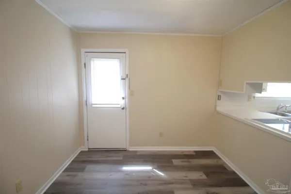 a view of a room that has a window in it