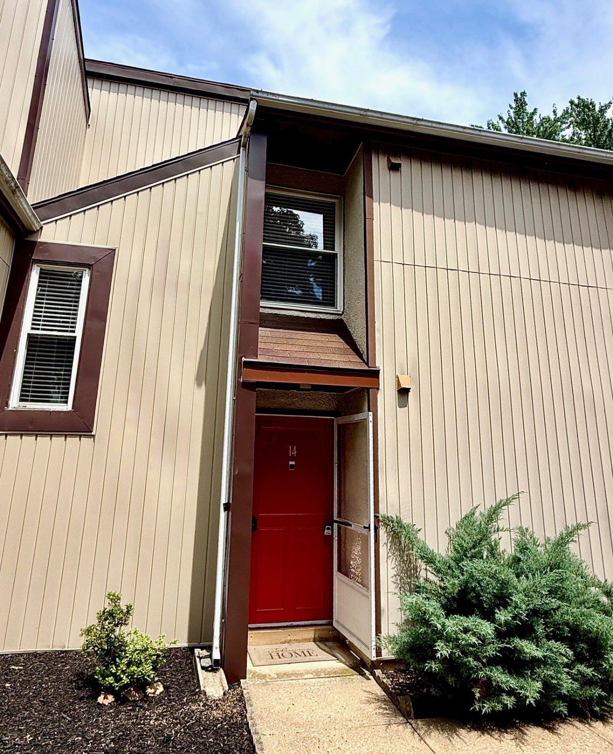 14 Ramsgate Court, Unit 14 York, PA 17404 - Photo 21 of 25 Entrance with vibrant red door and new siding