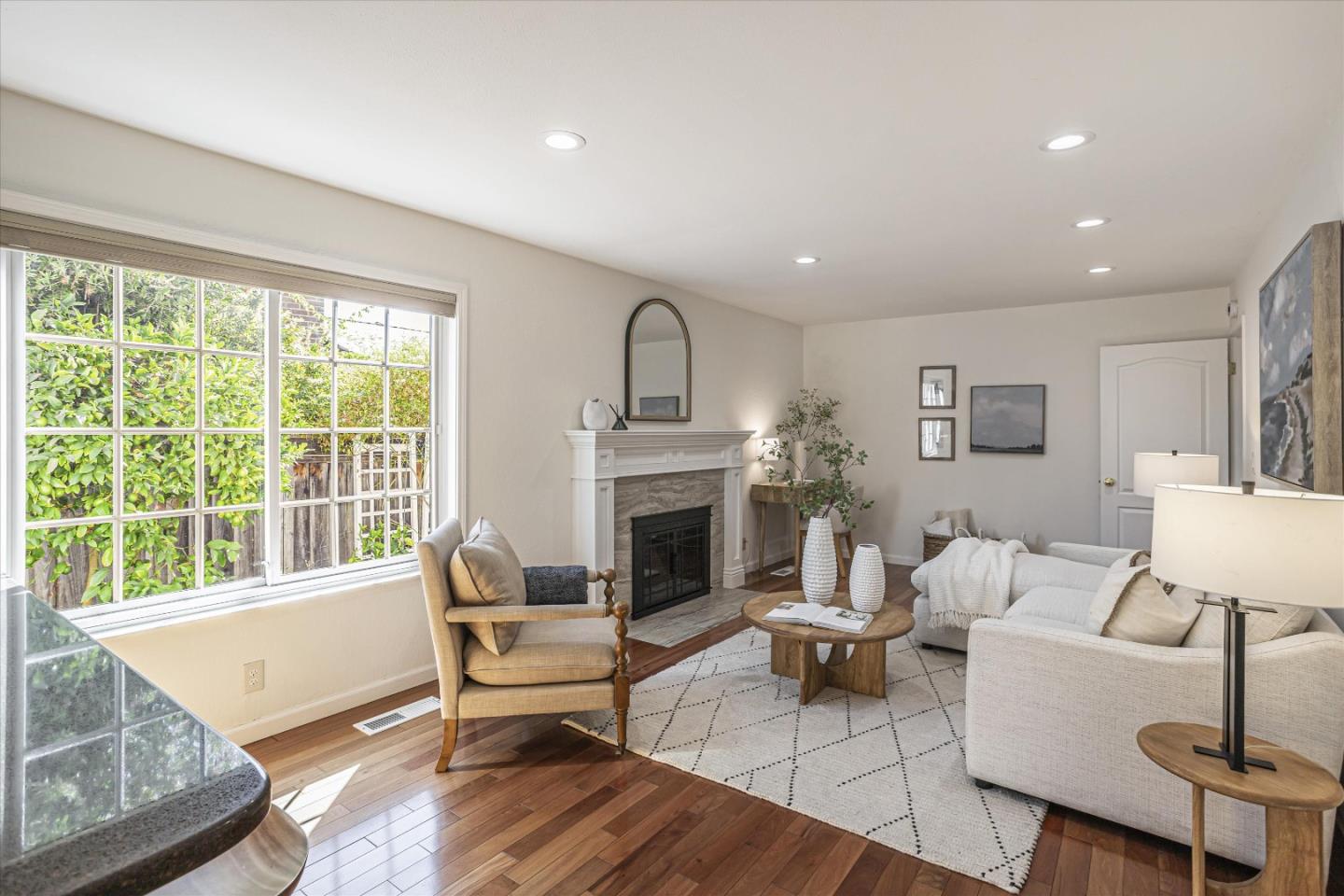 6367 Prospect Road San Jose, CA 95129 - Photo 13 of 33 a living room with furniture and a fireplace