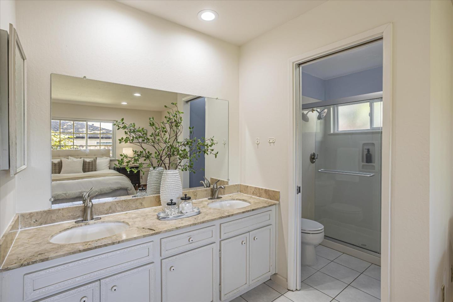 6367 Prospect Road San Jose, CA 95129 - Photo 18 of 33 a bathroom with a granite countertop sink mirror and toilet