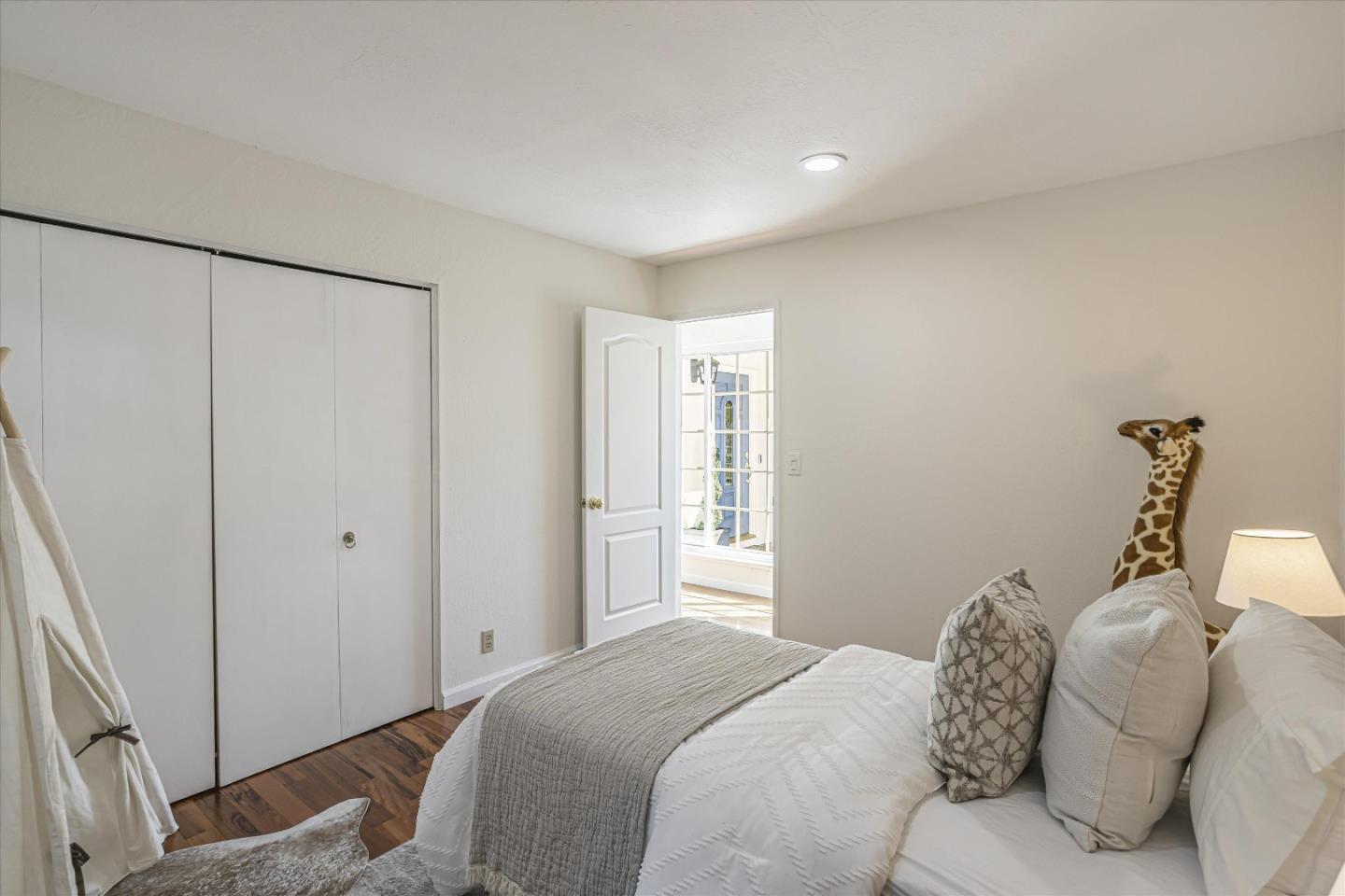 6367 Prospect Road San Jose, CA 95129 - Photo 20 of 33 a bedroom with a bed and a window