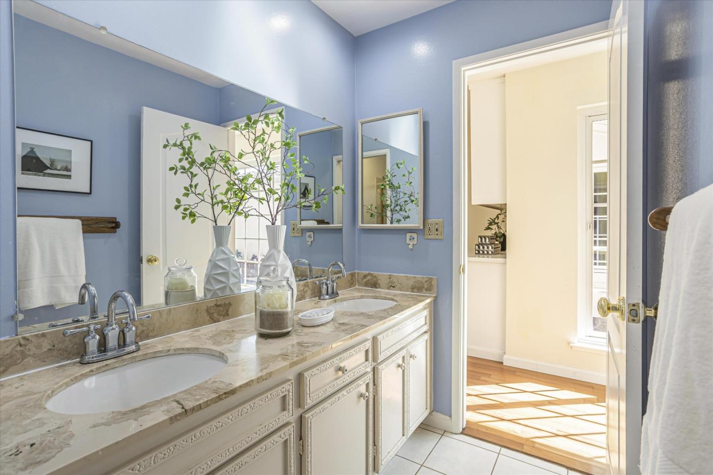 6367 Prospect Road San Jose, CA 95129 - Photo 21 of 33 a bathroom with a granite countertop sink and a mirror