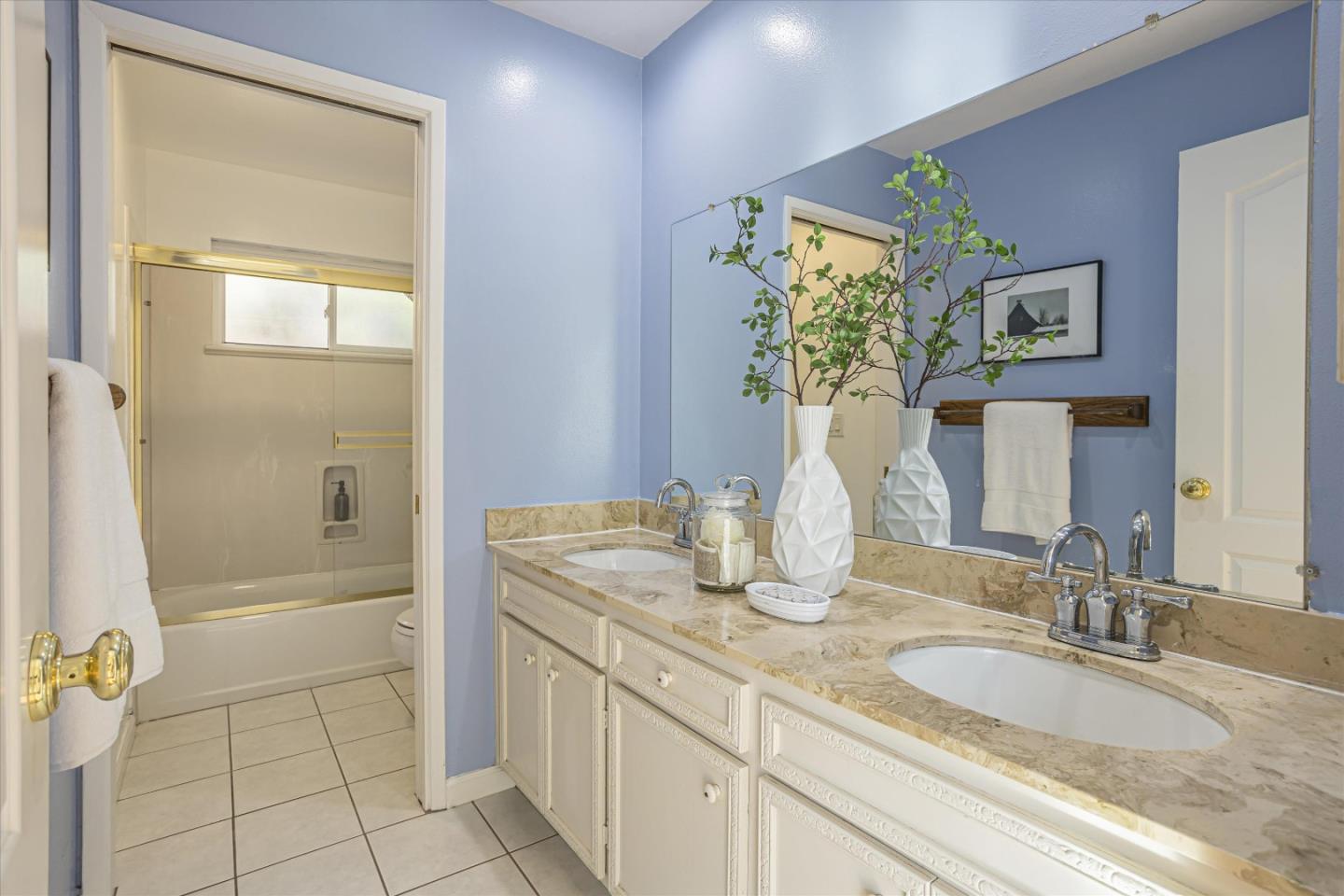 6367 Prospect Road San Jose, CA 95129 - Photo 22 of 33 a bathroom with a granite countertop sink a toilet and shower