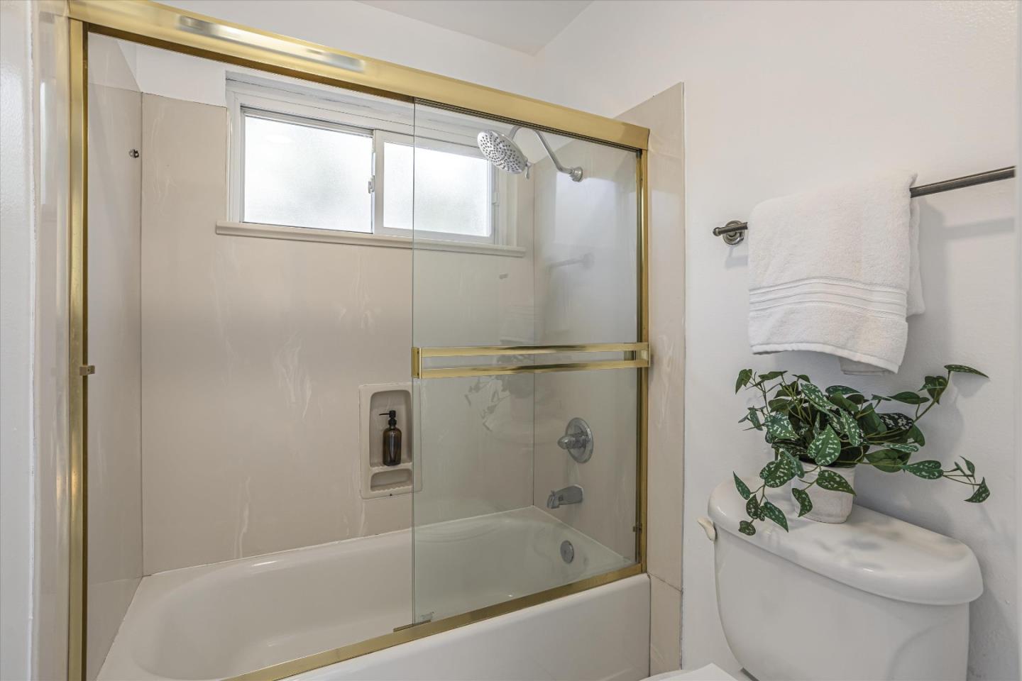 6367 Prospect Road San Jose, CA 95129 - Photo 23 of 33 a bath room with a toilet and a bath tub